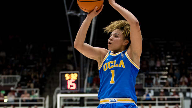 UCLA Bruins guard Kiki Rice shoots the ball.